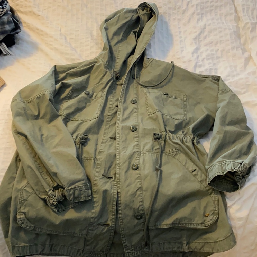 LOOK what’s back in style! Woman’s lightweight spring jacket with hood.